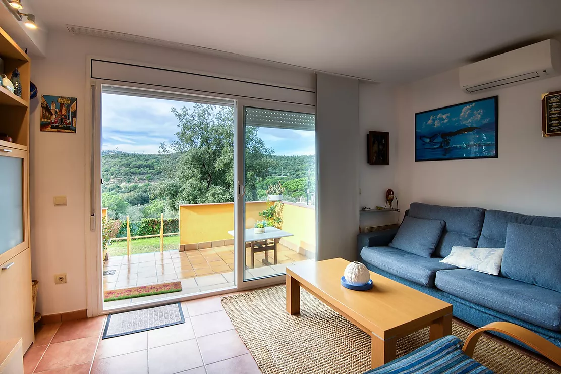 Corner townhouse with a communal pool.